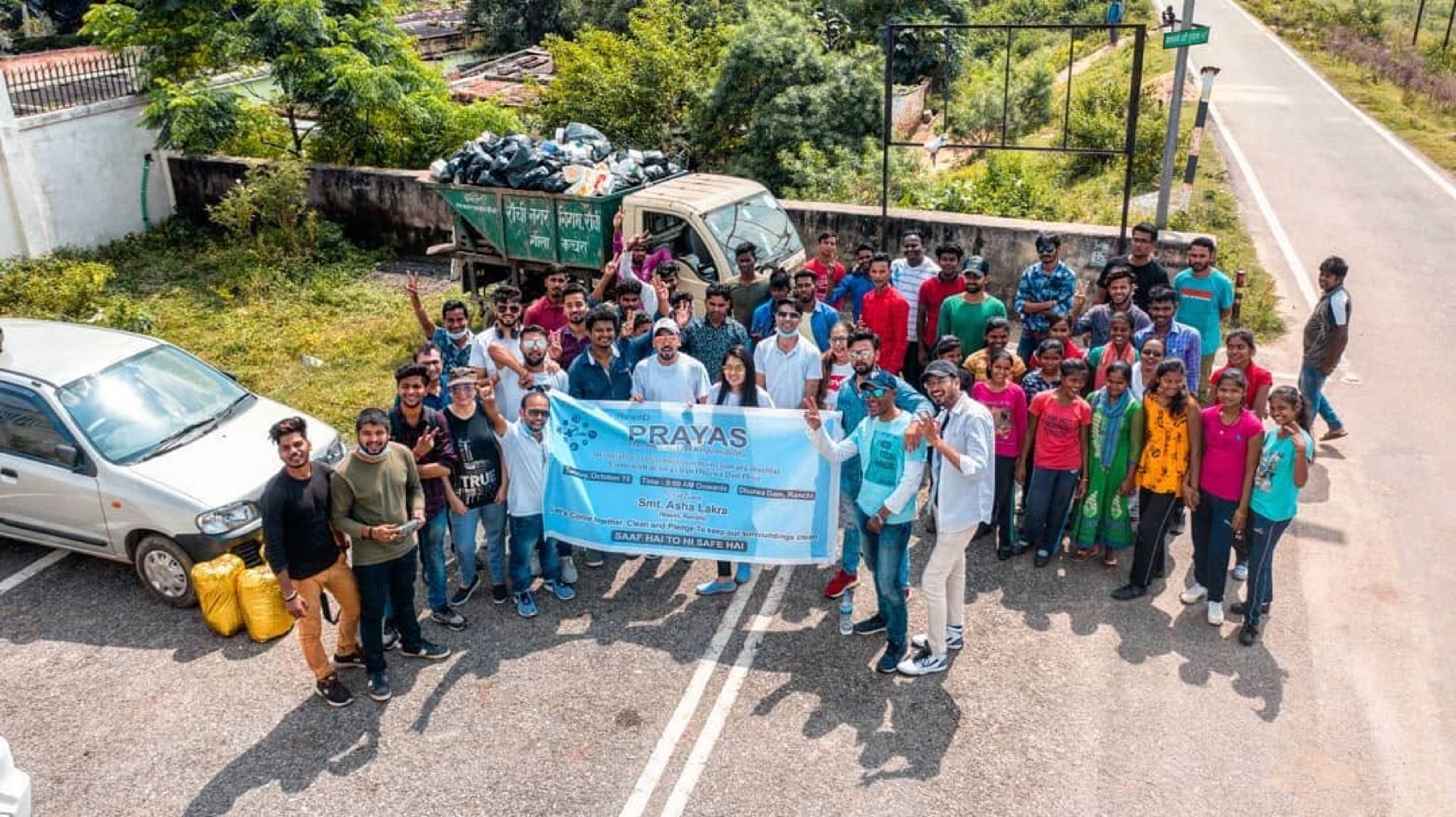 Volunteers gathered for Prattyancha's Dhurwa Dam cleanup campaign