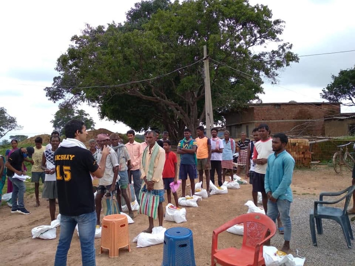 Prattyancha volunteers distributing ration kits in a rural community